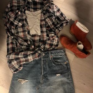 Get festival ready with this plaid light weight button down.